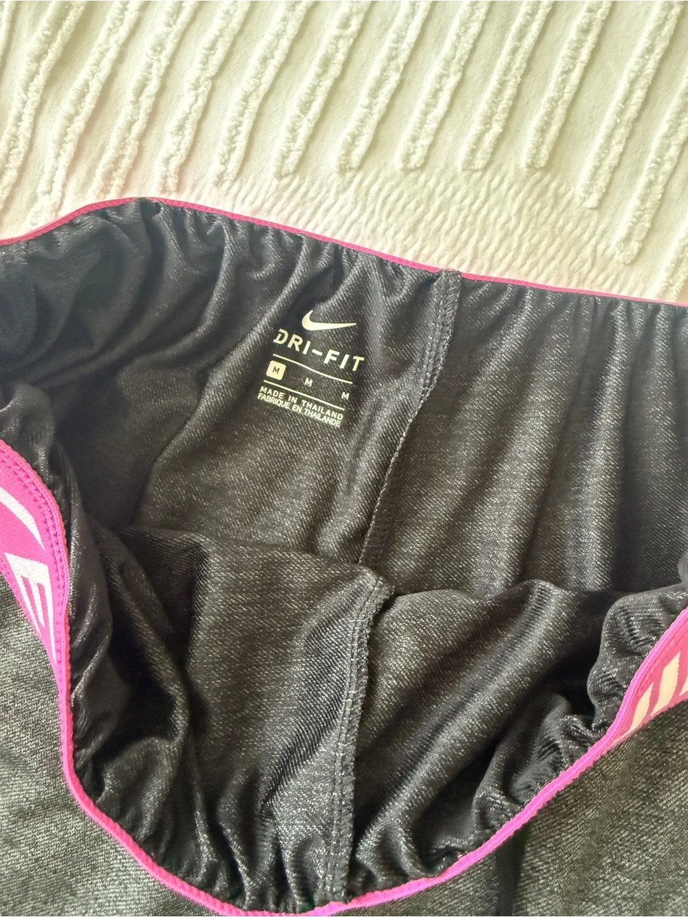 Nike Women's Charcoal Athletic Shorts with Pink Swoosh